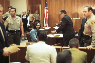 Charles Manson sits in the courtroom during his murder trial in 1970 in Los Angeles, California. (Photo: Michael Ochs Archives/Getty Images)